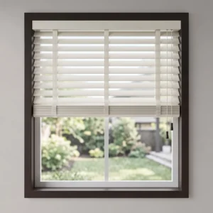 white wood blinds inside dark window frame